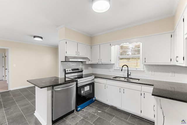 kitchen featuring dark tile patterned flooring, white cabinets, stainless steel appliances, sink, and ornamental molding