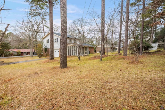 view of yard featuring a garage