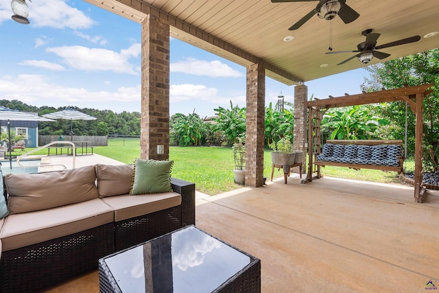 view of patio featuring ceiling fan and outdoor lounge area