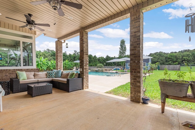 view of patio / terrace featuring an outdoor living space and ceiling fan