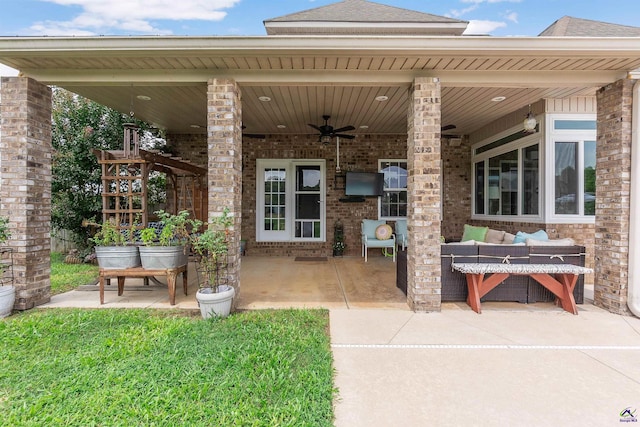 view of patio with ceiling fan and an outdoor hangout area