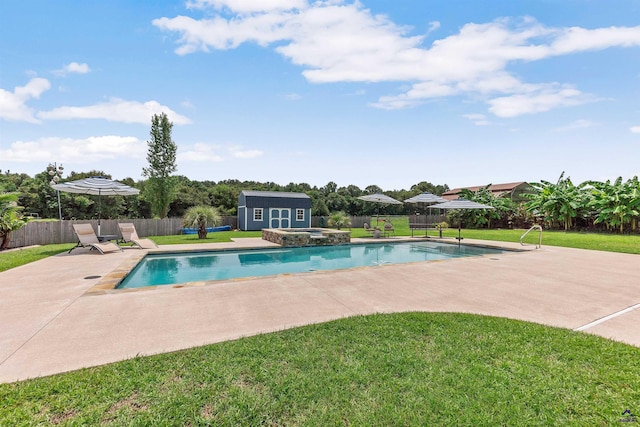 view of swimming pool featuring an in ground hot tub, a patio, an outdoor structure, and a lawn