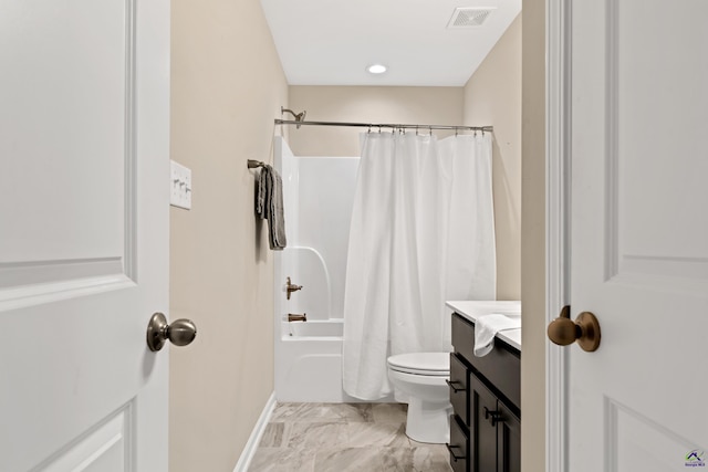 full bathroom featuring shower / bath combo, toilet, and vanity