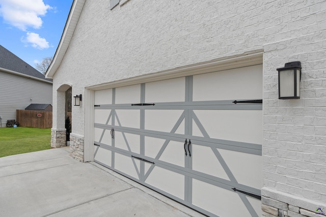 garage featuring a yard