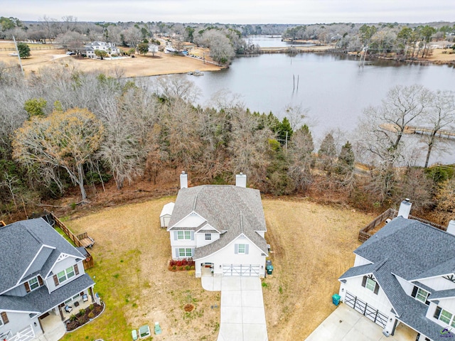 birds eye view of property featuring a water view