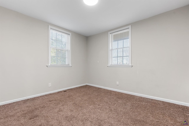 view of carpeted spare room