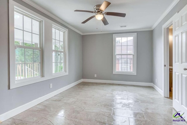 empty room featuring ornamental molding and ceiling fan