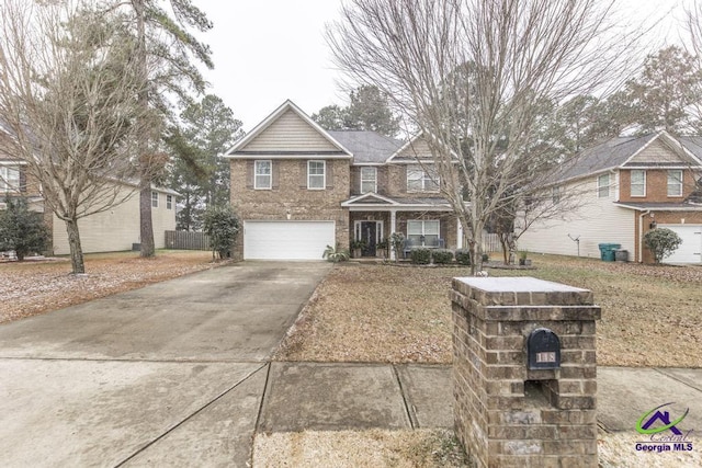 view of front of property featuring a garage