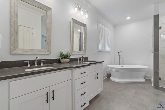 bathroom featuring vanity, crown molding, and independent shower and bath