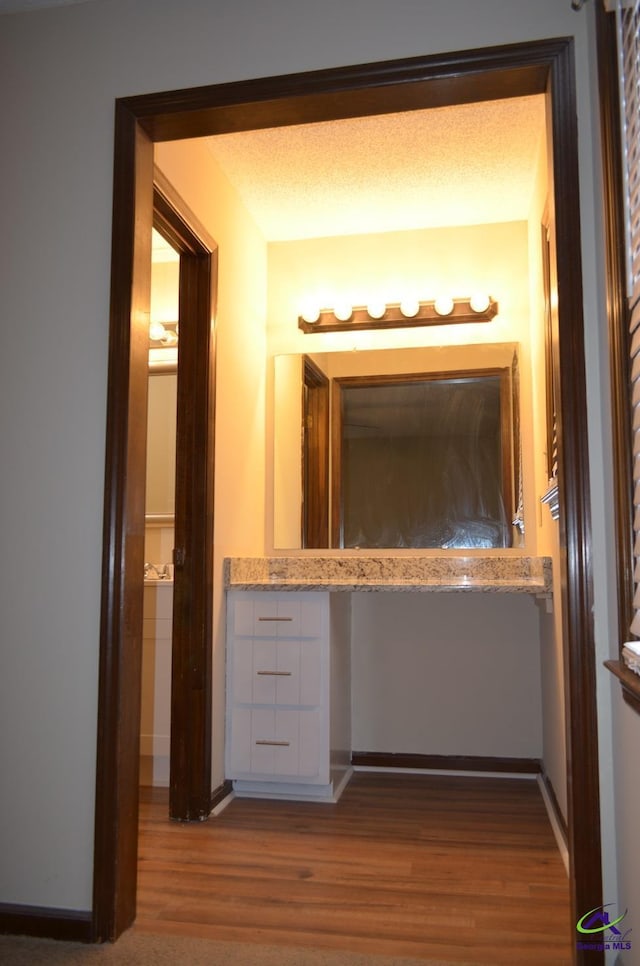 bathroom featuring hardwood / wood-style flooring