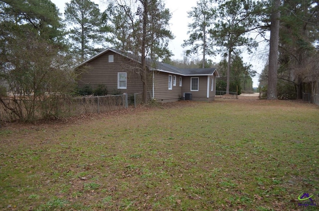 view of property exterior featuring a yard and central air condition unit