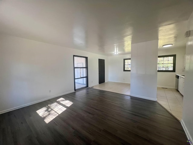 unfurnished room with light hardwood / wood-style flooring