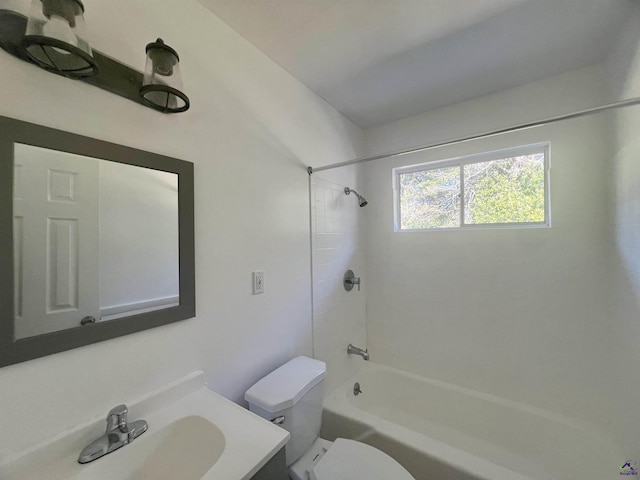 full bathroom with bathing tub / shower combination, vanity, and toilet