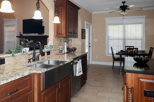 kitchen with sink, decorative backsplash, stainless steel dishwasher, light stone counters, and crown molding