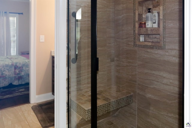 bathroom featuring tiled shower