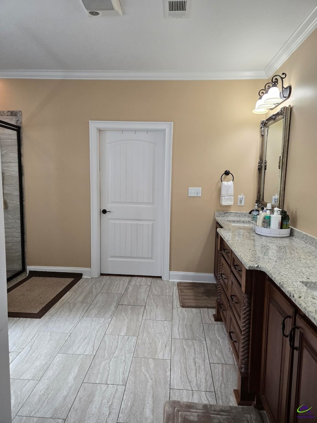 bathroom featuring vanity and ornamental molding