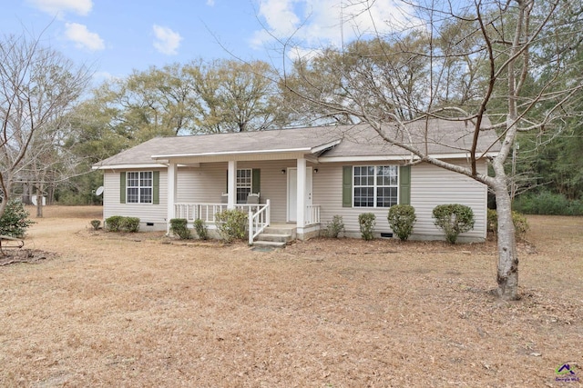 single story home featuring covered porch