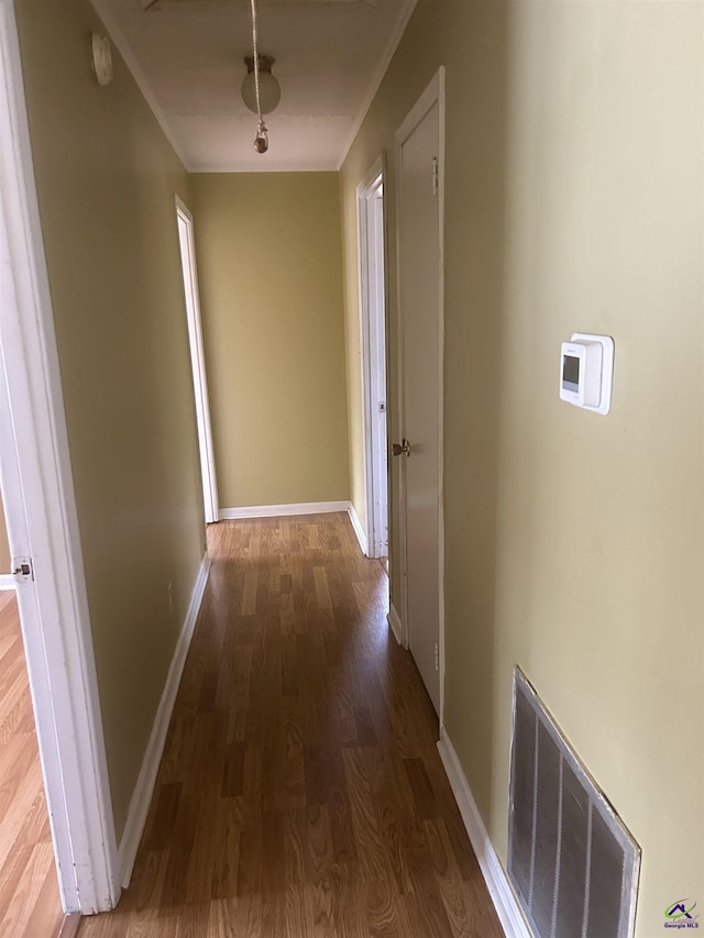 corridor featuring hardwood / wood-style flooring