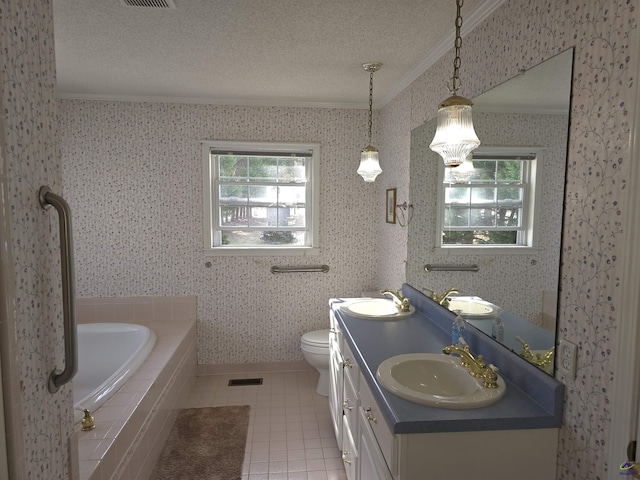 full bath with double vanity, ornamental molding, tile patterned floors, a textured ceiling, and a sink