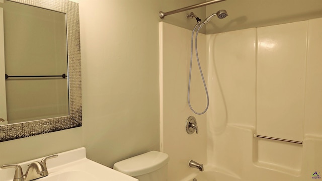 full bathroom featuring toilet, shower / bath combination, and sink