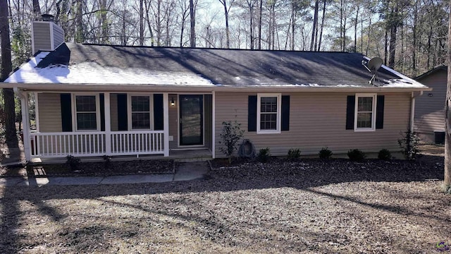 single story home with a porch