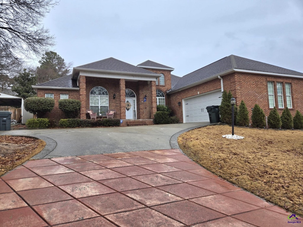 view of front of property with a garage