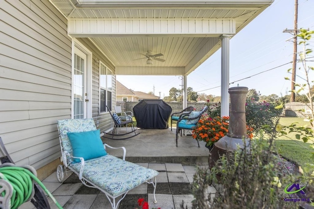 view of patio / terrace featuring a grill and ceiling fan