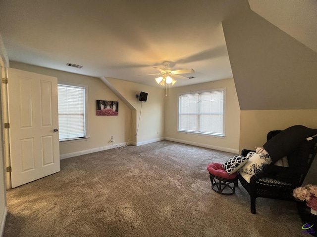 bonus room featuring carpet floors, baseboards, visible vents, and ceiling fan