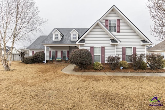 306 Lovorn Cir, Warner Robins, GA 31088 - view of front of home with a front lawn and a shingled roof