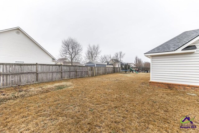 306 Lovorn Cir, Warner Robins, GA 31088 - view of yard featuring a playground