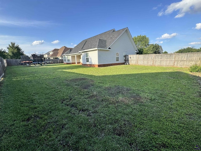 306 Lovorn Cir, Warner Robins, GA 31088 - view of yard with a trampoline