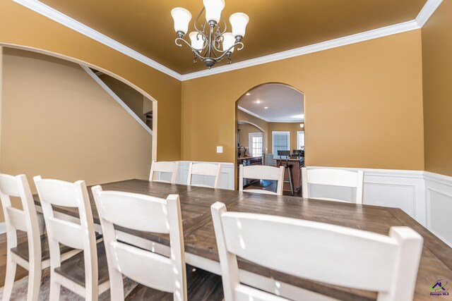 105 Reflection Dr, Bonaire, GA 31005 - dining space featuring crown molding and an inviting chandelier