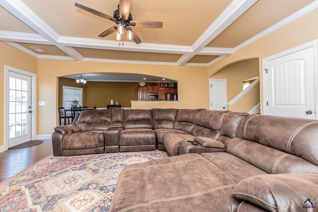 105 Reflection Dr, Bonaire, GA 31005 - living room featuring hardwood / wood-style flooring, ceiling fan with notable chandelier, ornamental molding, and beamed ceiling