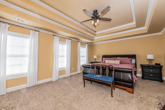 105 Reflection Dr, Bonaire, GA 31005 - bedroom featuring light carpet, a tray ceiling, ornamental molding, and ceiling fan