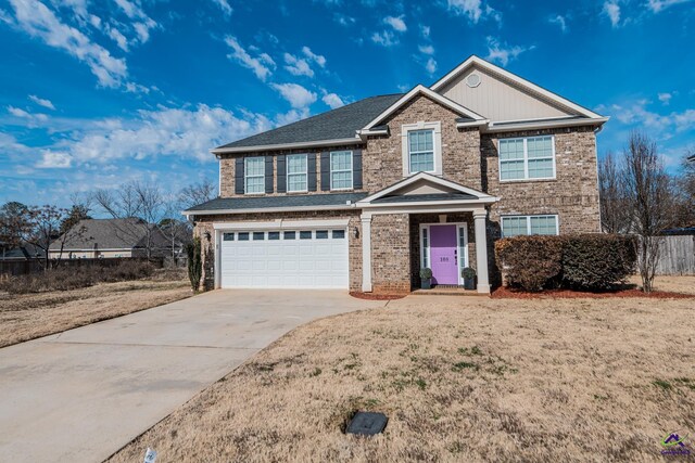 105 Reflection Dr, Bonaire, GA 31005 - view of front facade with a garage and a front lawn