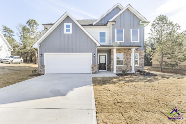 view of front of house featuring a garage and covered porch