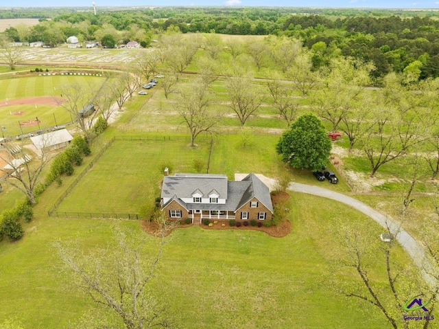 birds eye view of property featuring a rural view