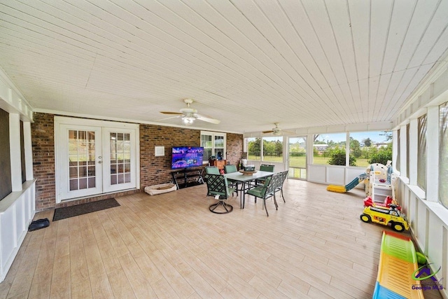 view of patio / terrace with a playground, ceiling fan, and french doors