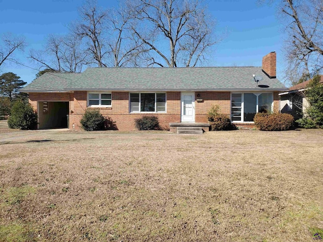 ranch-style house with a front lawn