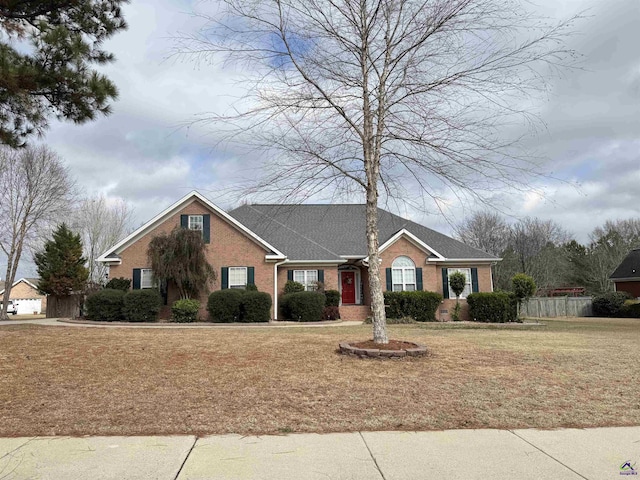 ranch-style house with a front yard