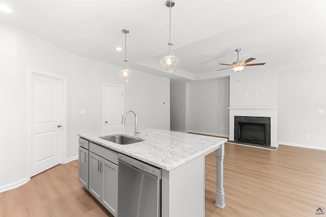 687 Jasmine Dr, Macon, GA 31211 - kitchen with a sink, stainless steel dishwasher, light wood-type flooring, ceiling fan, and recessed lighting