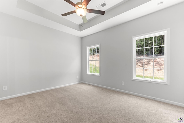 687 Jasmine Dr, Macon, GA 31211 - empty room featuring carpet floors, baseboards, ceiling fan, a tray ceiling, and a smoke detector