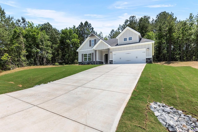 687 Jasmine Dr, Macon, GA 31211 - craftsman inspired home with board and batten siding, driveway, a front yard, and an attached garage