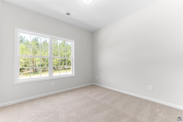 687 Jasmine Dr, Macon, GA 31211 - carpeted spare room featuring baseboards
