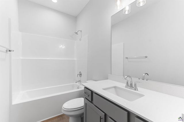 687 Jasmine Dr, Macon, GA 31211 - full bath with toilet, vanity, wood finished floors, and tub / shower combination