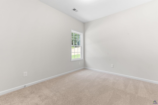 687 Jasmine Dr, Macon, GA 31211 - unfurnished room with baseboards and light colored carpet