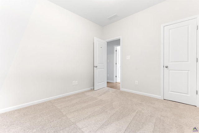 687 Jasmine Dr, Macon, GA 31211 - unfurnished bedroom with carpet flooring and baseboards