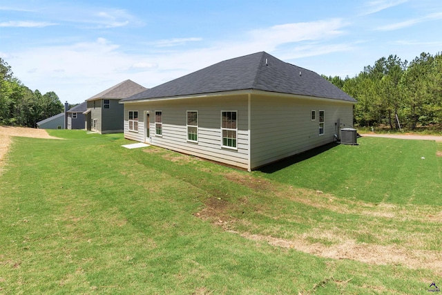 687 Jasmine Dr, Macon, GA 31211 - view of side of property with a yard and central AC unit