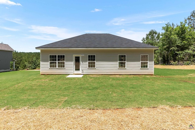 687 Jasmine Dr, Macon, GA 31211 - rear view of house with a lawn