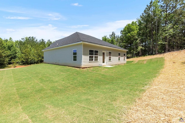 687 Jasmine Dr, Macon, GA 31211 - view of side of property featuring a yard